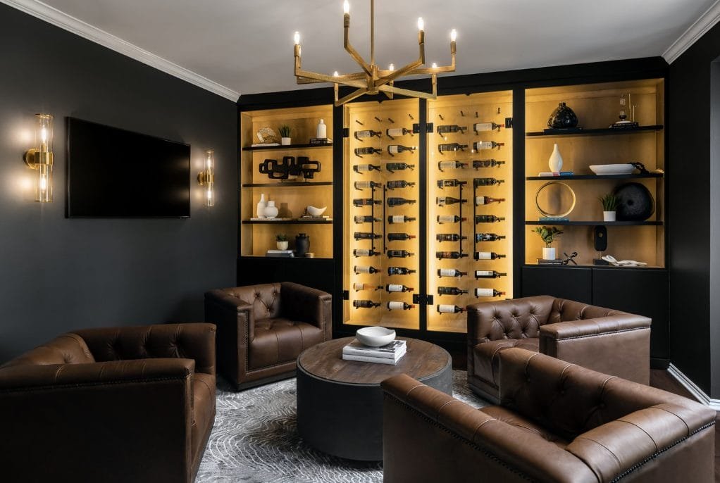 Modern dark college-inspired living room by Decorilla designer Kaitlyn B.