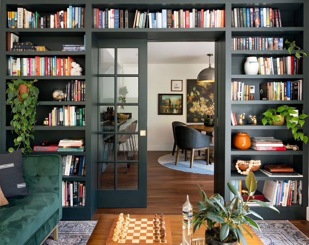 A timeless bookcase in a modern take on dark academic style by Decorilla designer Sadi M