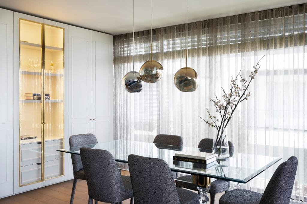 Modern dining room trending ceiling lights by DECORILLA designer, Meric S.