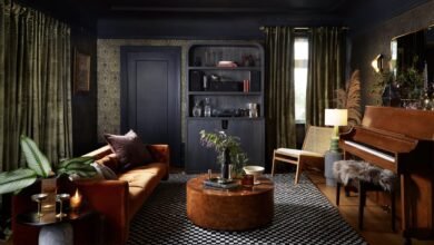 Traditional living room with dark academia aesthetic by Decorilla designer Bridget B