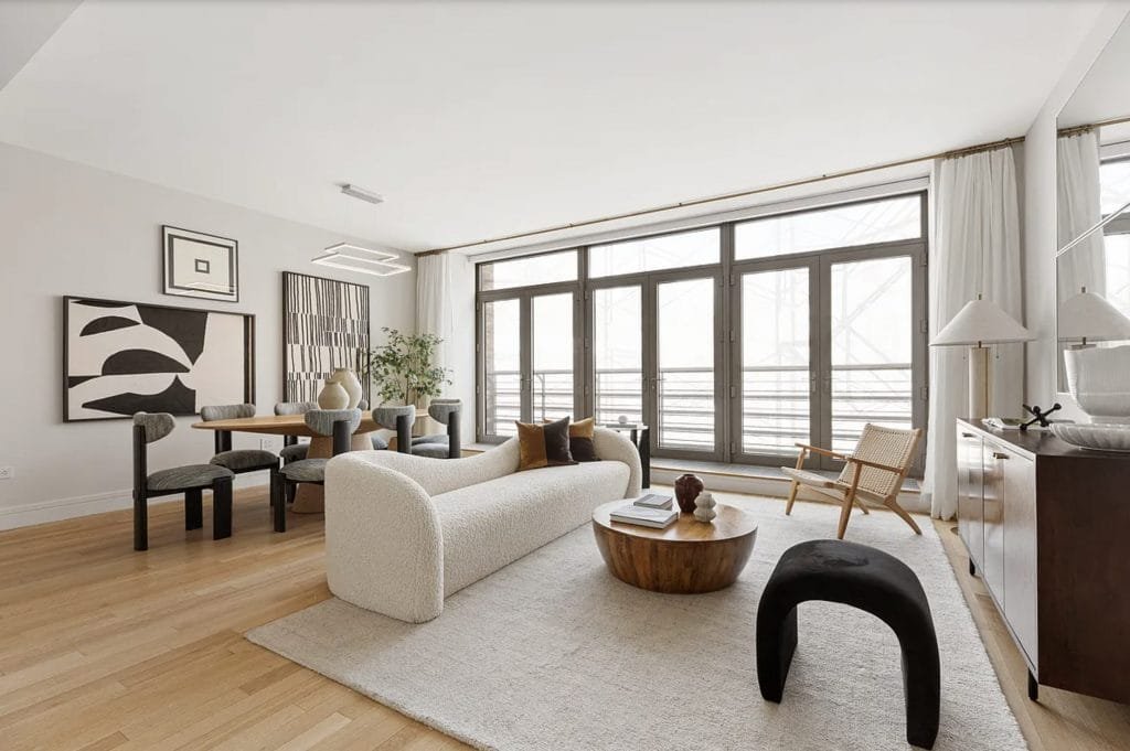 Living room trends 2026 applied in a contemporary living & dining room by Decorilla designer, Leanna S.